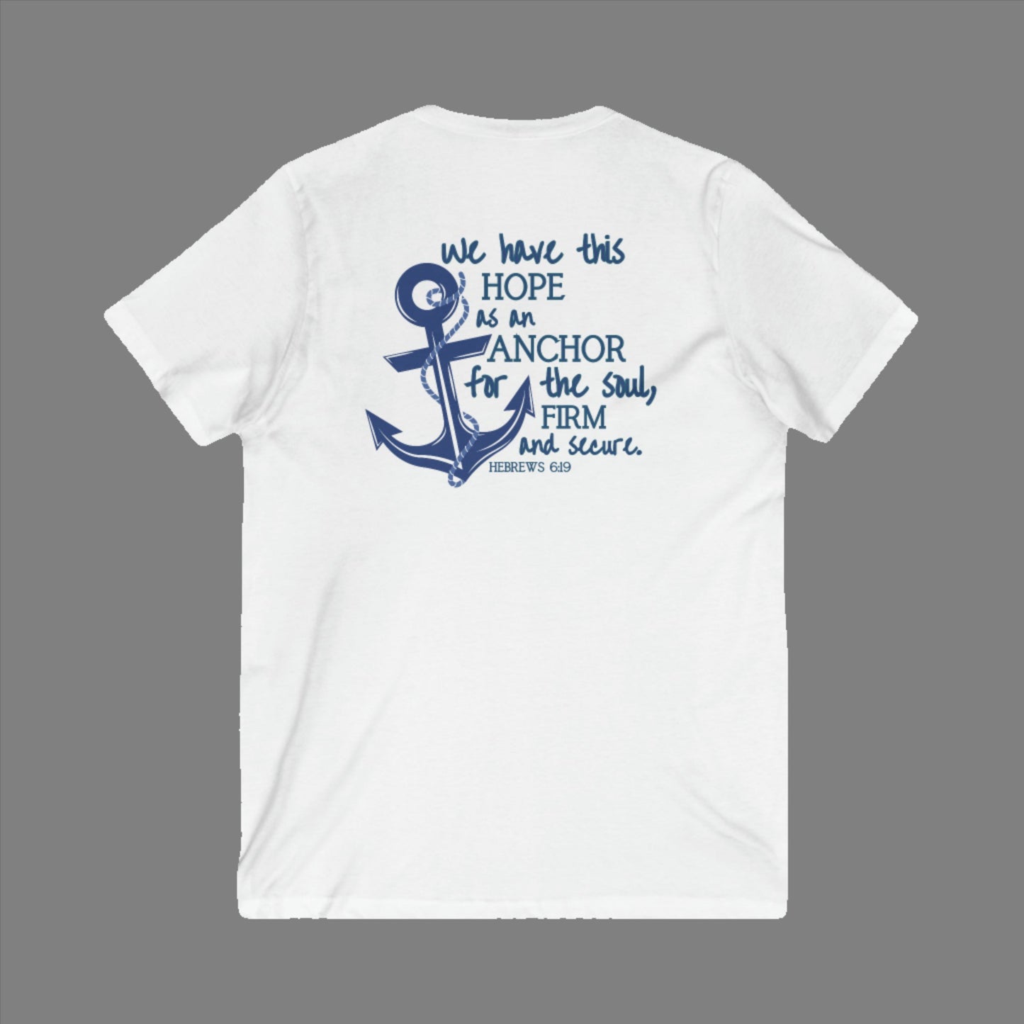 We have this hope as an anchor for the soul, firm and secure. Hebrews 6:19. This nautical Christian v-neck tee features a small anchor on the front with a large anchor and the Hebrews 6:19 bible verse in decorative font down the back. Cataldo Creations Christian Clothing, Christian T-Shirt, Christian Apparel. Bible Verse And Scripture Tees