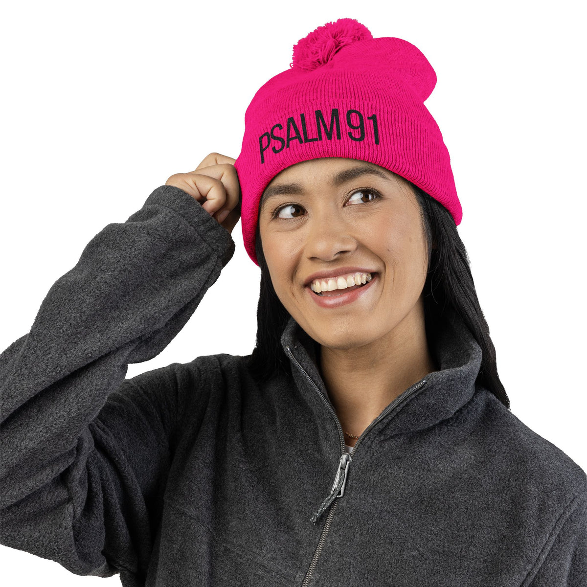 Person wearing a pink beanie with 'PSALM 91' text on a white background
