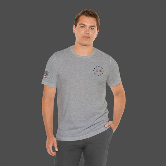 One Nation Under God, 1776 Patriotic tee for men and women. This Cataldo Creations patriot t-shirt has 1776 on the front chest pocket area and One Nation Under God on the back. Show your patriotism with this American Patriot short sleeve tee.