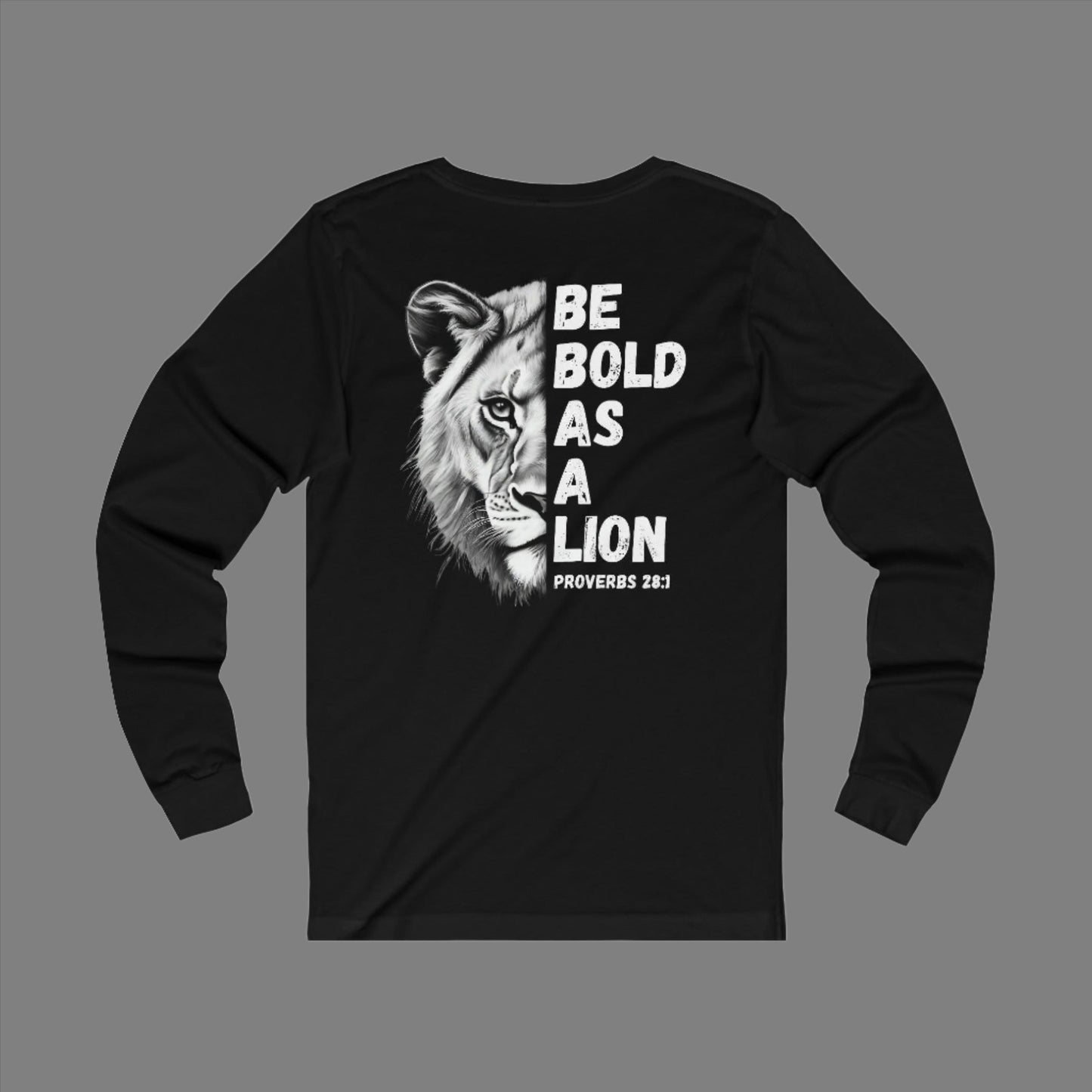 Be Bold As A Lion Christian Proverbs Tee. Bible Verse Lion T-Shirt. Unisex Jersey Long Sleeve Tee. Cross bible verse tee for men and women.
