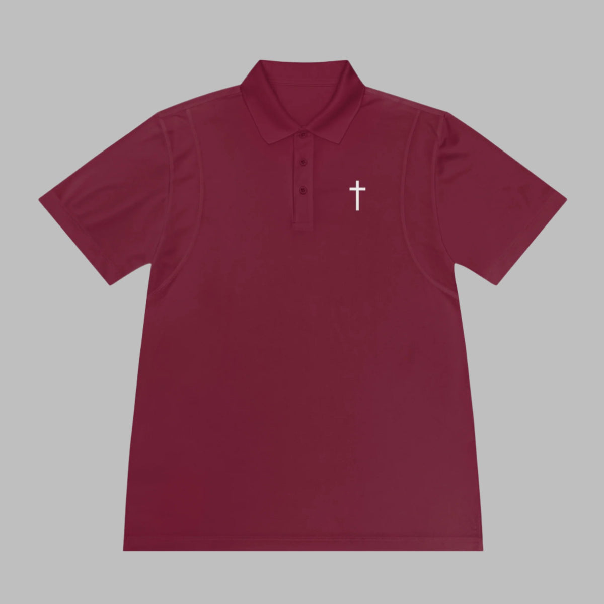 Meet the Cataldo Creations Cross Golf Polo for men. This lightweight, fast drying athletic polo is a perfect conversation starter on the course. With a small cross on the front chest, this design is simple and timeless. Christian golfer. Christian athletic apparel. Faith based apparel.