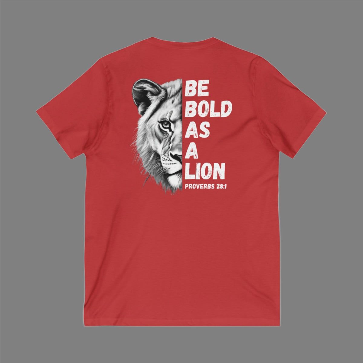 The 'Be Bold As A Lion' v-neck tee. The lion face pops with its gorgeous, lifelike markings throughout. In a big bold font, a reminder of God's word in Proverbs 28:1 from the Bible, to "Be Bold As A Lion". With a small cross on the front chest and available in different colors (and styles!) this t-shirt is one you will feel fearless wearing! Cataldo Creations Christian clothing. Faith Based apparel
