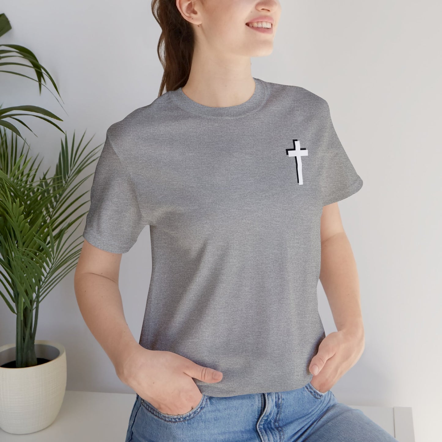 Kingdom Seeker, Faith Walker, Believer, Spiritual Warrior, Watchman, Disciple, Good Servant, Child Of God. This gorgeous Christian crew neck t-shirt has a large faith based design on the back with a cross behind the various names for Children of God. With a subtle cross design on the front, you can wear your faith boldly with this Cataldo Creations short sleeve tee!