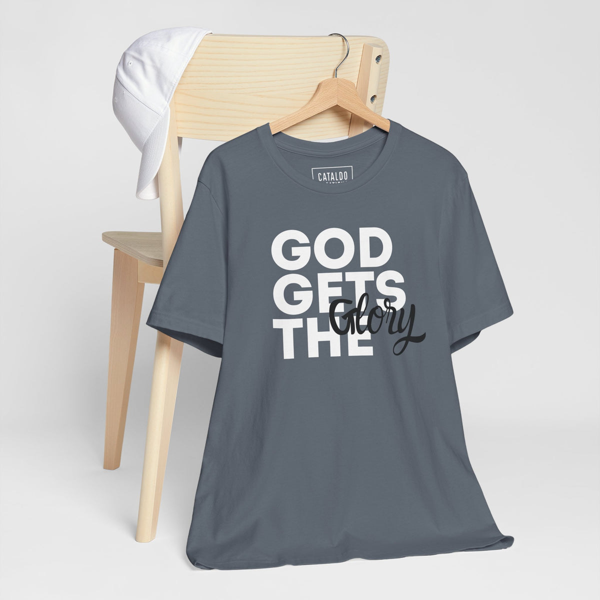 God Gets The Glory! This bold Christian t-shirt has a bold message and is available in many different colors. Grab this Cataldo Creations t-shirt for everyone in the family today!