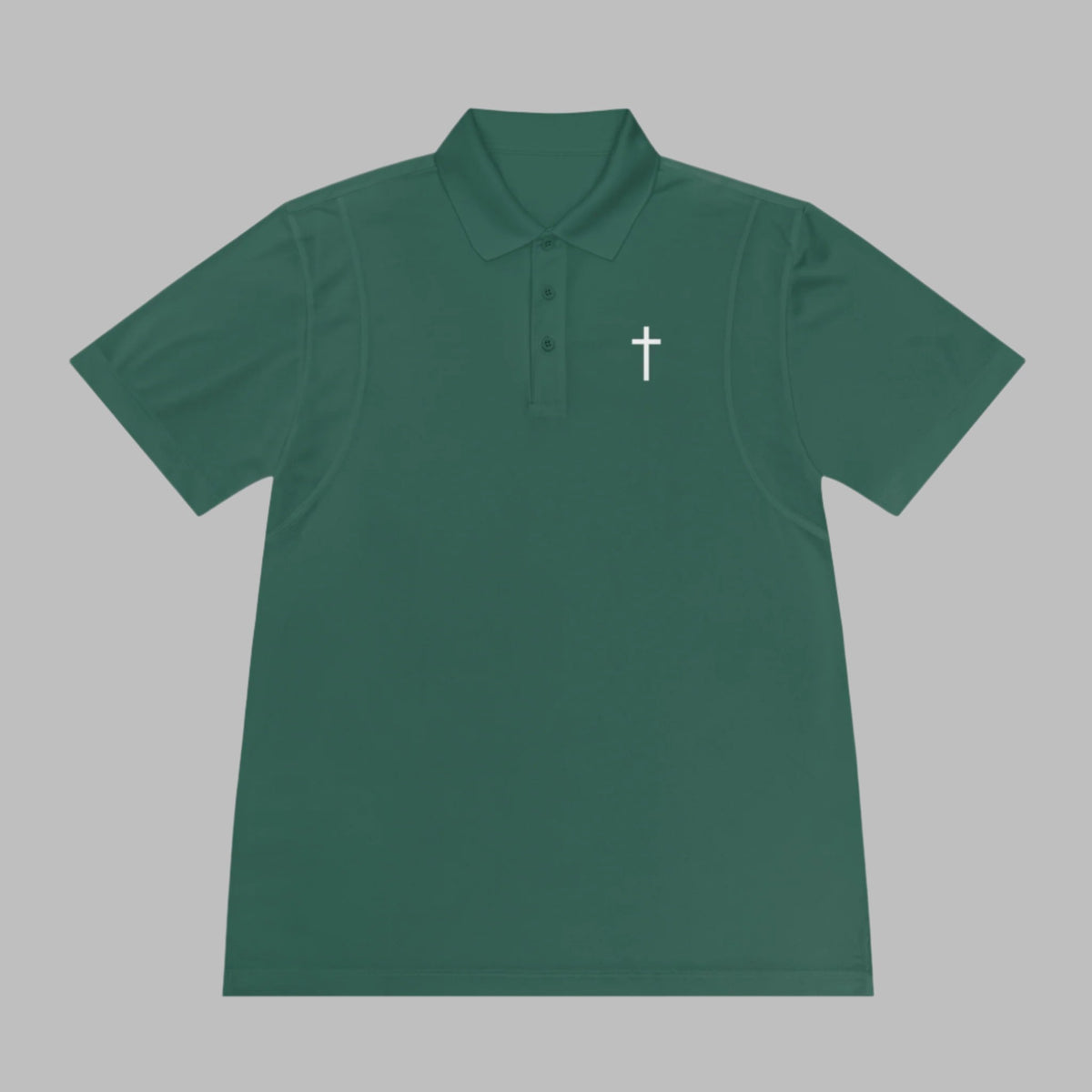 Meet the Cataldo Creations Cross Golf Polo for men. This lightweight, fast drying athletic polo is a perfect conversation starter on the course. With a small cross on the front chest, this design is simple and timeless. Christian golfer. Christian athletic apparel. Faith based apparel.