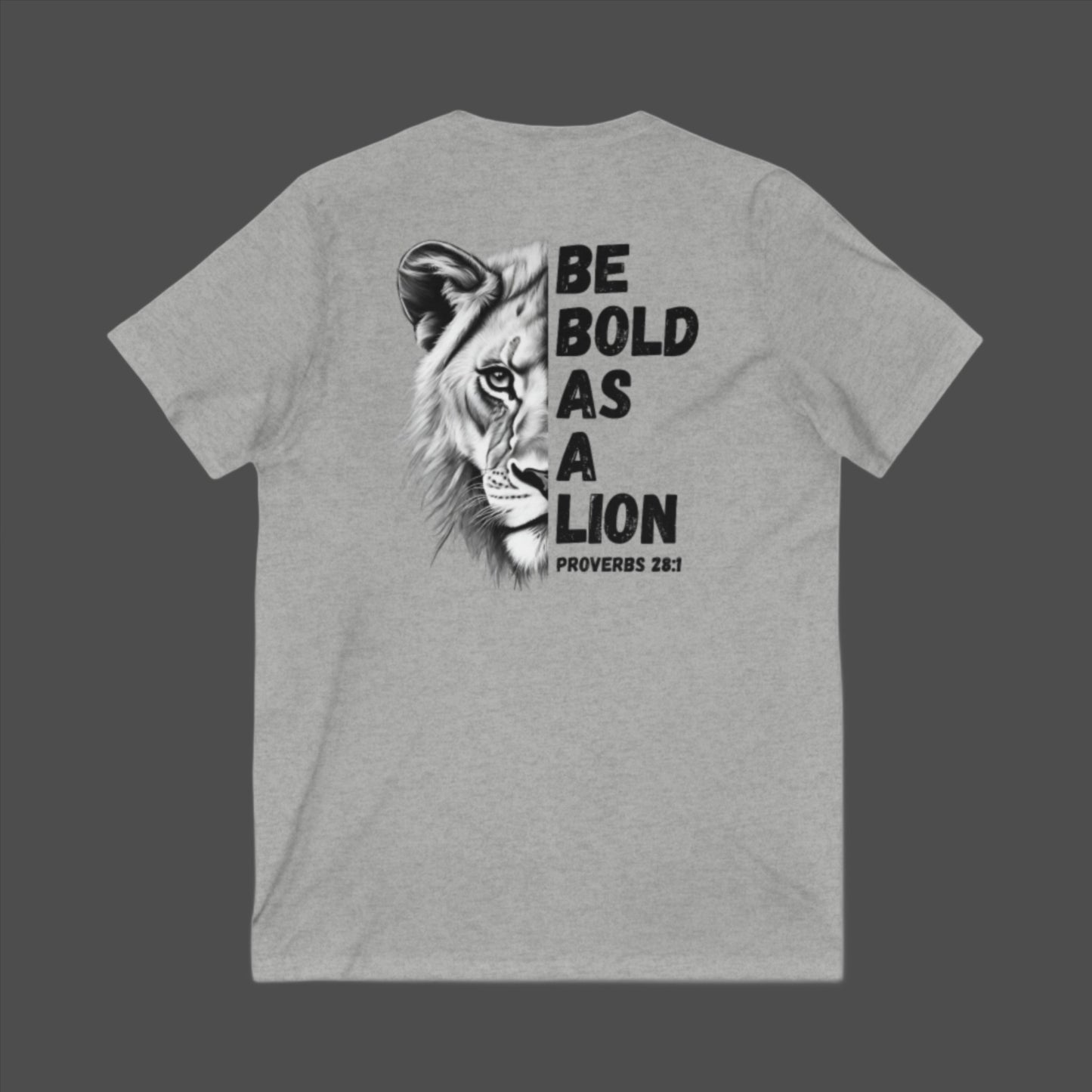 The 'Be Bold As A Lion' v-neck tee. The lion face pops with its gorgeous, lifelike markings throughout. In a big bold font, a reminder of God's word in Proverbs 28:1 from the Bible, to "Be Bold As A Lion". With a small cross on the front chest and available in different colors (and styles!) this t-shirt is one you will feel fearless wearing! Cataldo Creations Christian clothing. Faith Based apparel