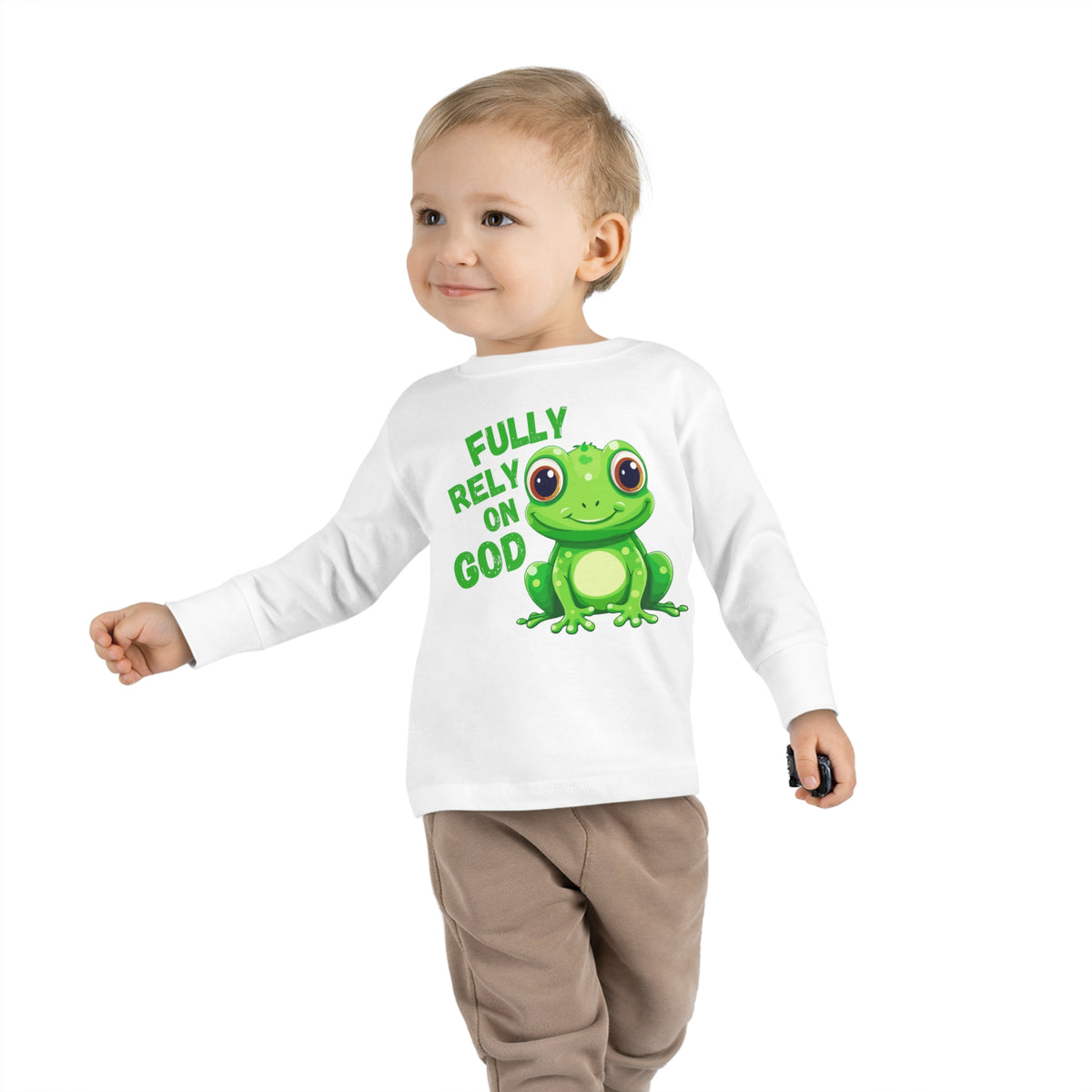 FROG. Fully Rely On God. This cute toddler long sleeve t-shirt has an adorable green frog with the words Fully Rely On God in green. Perfect for your Christian toddler!