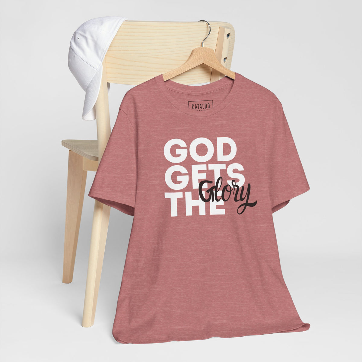 God Gets The Glory! This bold Christian t-shirt has a bold message and is available in many different colors. Grab this Cataldo Creations t-shirt for everyone in the family today!