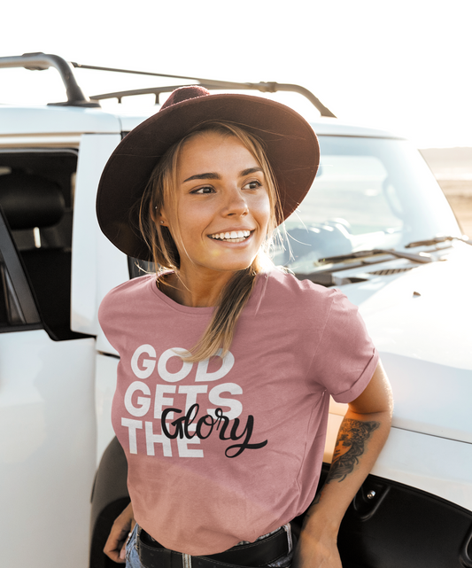God Gets The Glory! This bold Christian t-shirt has a bold message and is available in many different colors. Grab this Cataldo Creations t-shirt for everyone in the family today!
