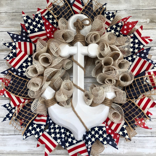 Nautical Anchor Door Wreath. Handmade Door Wreath. Anchors Away! This red, white and blue patriotic door wreath is the perfect wreath for the patriotic boater! The white wood anchor pops off its stars and stripes backdrop and it is a must have for your home.