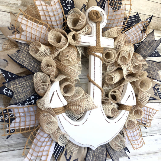 Nautical Anchor Door Wreath. Anchors Away! This beige, navy and white door wreath has a classic color scheme and subtle shimmer. This wreath will look great on your door or that open spot on your wall! Handmade Door Wreath.