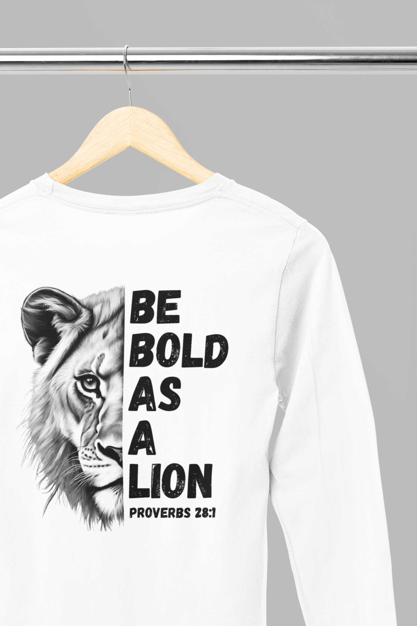 Be Bold As A Lion Christian Proverbs Tee. Bible Verse Lion T-Shirt. Unisex Jersey Long Sleeve Tee. Cross bible verse tee for men and women.