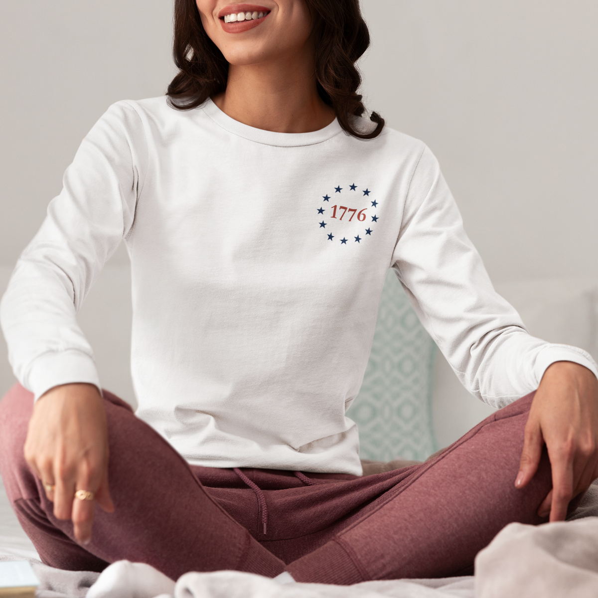 One Nation Under God, 1776 Patriotic long sleeve shirt for men and women. This Cataldo Creations tee has 1776 on the front chest pocket area and One Nation Under God on the back. Show your patriotism with this American Patriot long sleeve tee today!