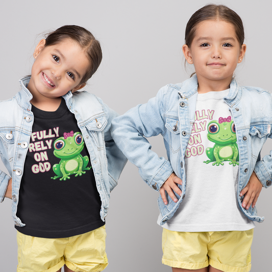FROG. Fully Rely On God. This cute little girl toddler short sleeve t-shirt has an adorable green frog wearing a pink bow. Alongside are the words Fully Rely On God in light green and pink lettering. Perfect for your toddler girl! Christian toddler tee. Cataldo Creations apparel for toddlers