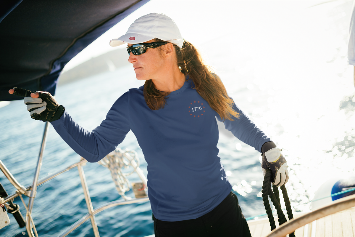 One Nation Under God, 1776 Patriotic UV protection long sleeve shirt for men and women. This Cataldo Creations tee has 1776 on the front chest pocket area and One Nation Under God on the back. Show your patriotism with this American Patriot long sleeve tee today! 