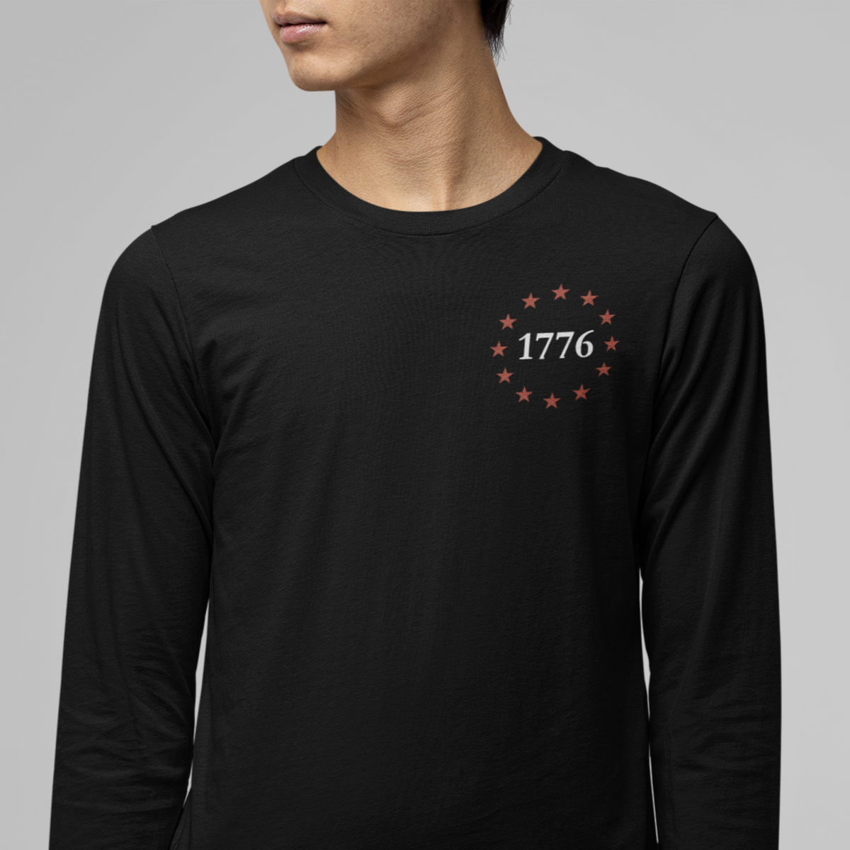 One Nation Under God, 1776 Patriotic long sleeve shirt for men and women. This Cataldo Creations tee has 1776 on the front chest pocket area and One Nation Under God on the back. Show your patriotism with this American Patriot long sleeve tee today!