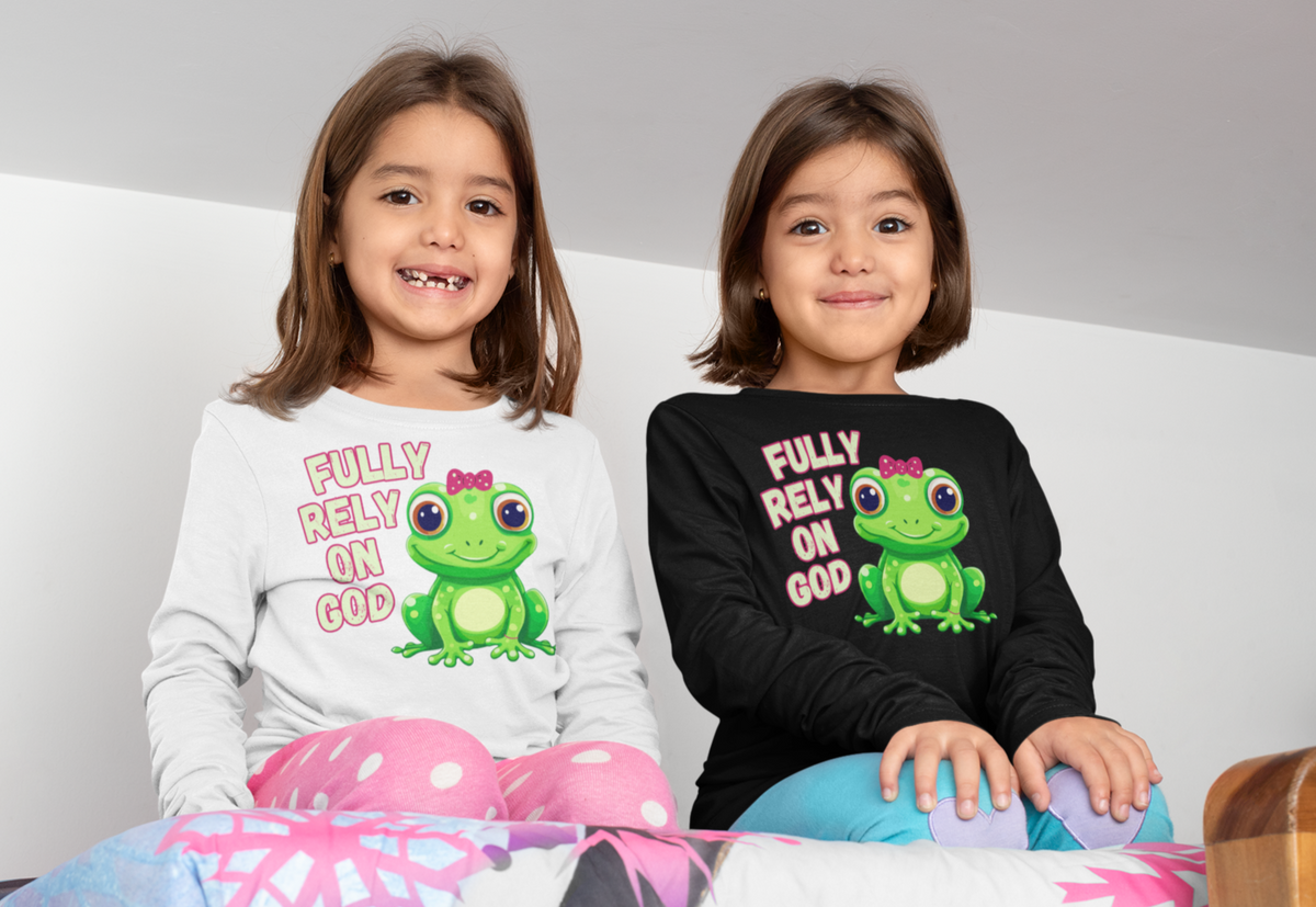 FROG. Fully Rely On God. This cute little girl toddler long sleeve t-shirt has an adorable green frog wearing a pink bow. Alongside are the words Fully Rely On God in light green and pink. Perfect for your toddler girl!