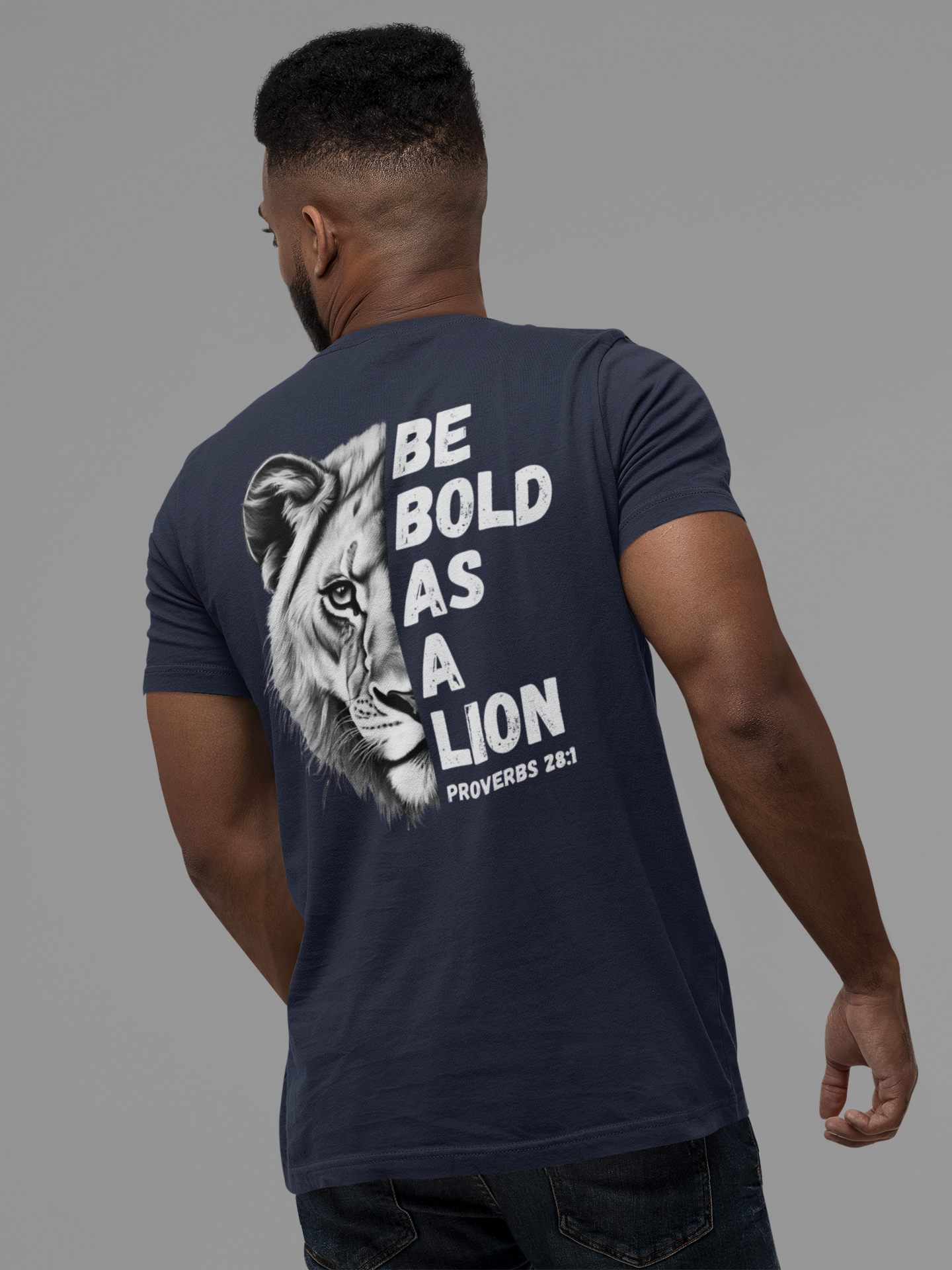 The 'Be Bold As A Lion' v-neck tee. The lion face pops with its gorgeous, lifelike markings throughout. In a big bold font, a reminder of God's word in Proverbs 28:1 from the Bible, to "Be Bold As A Lion". With a small cross on the front chest and available in different colors (and styles!) this t-shirt is one you will feel fearless wearing! Cataldo Creations Christian clothing. Faith Based apparel