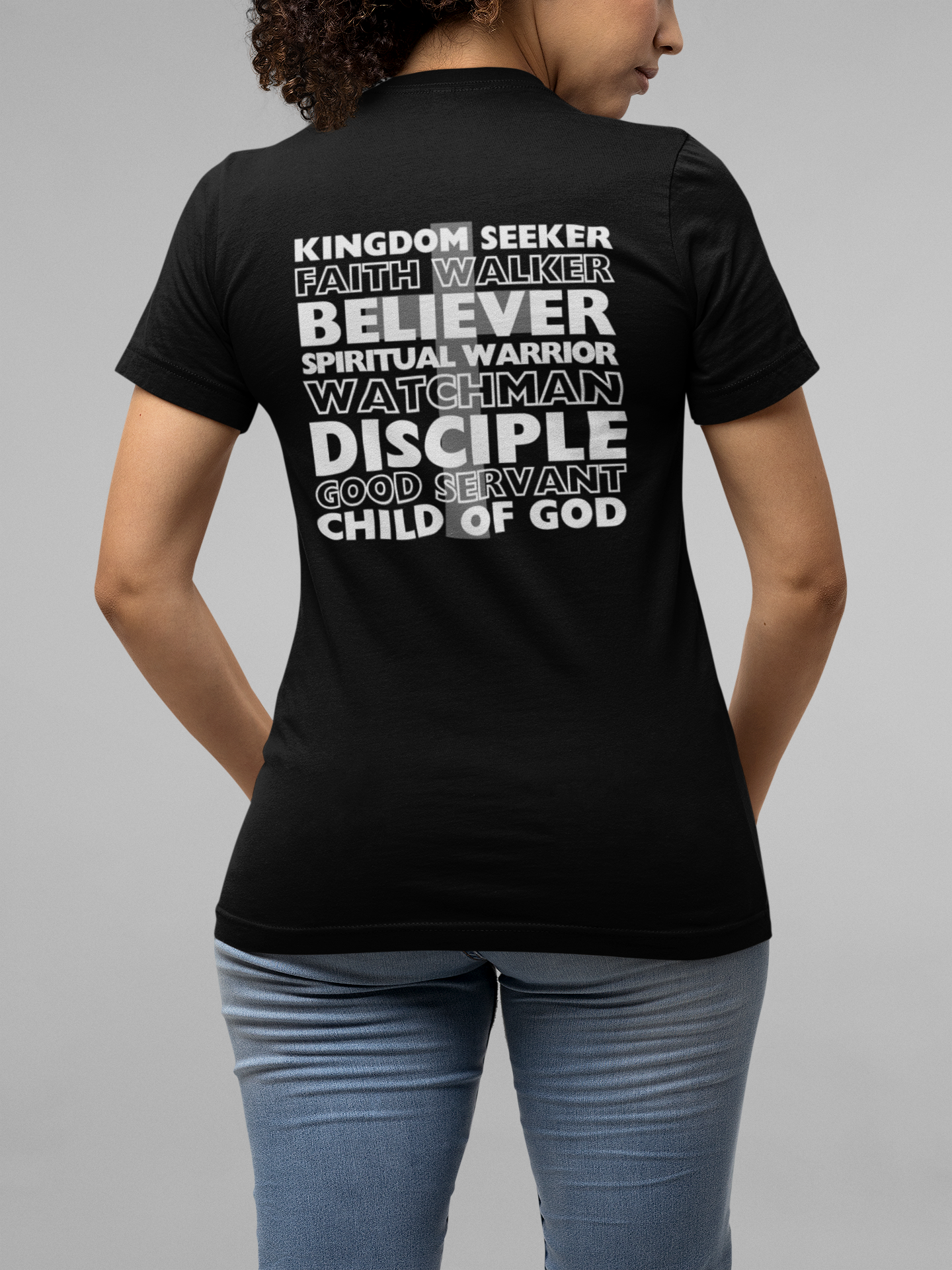 Kingdom Seeker, Faith Walker, Believer, Spiritual Warrior, Watchman, Disciple, Good Servant, Child Of God. This gorgeous Christian crew neck t-shirt has a large faith based design on the back with a cross behind the various names for Children of God. With a subtle cross design on the front, you can wear your faith boldly with this Cataldo Creations short sleeve tee!