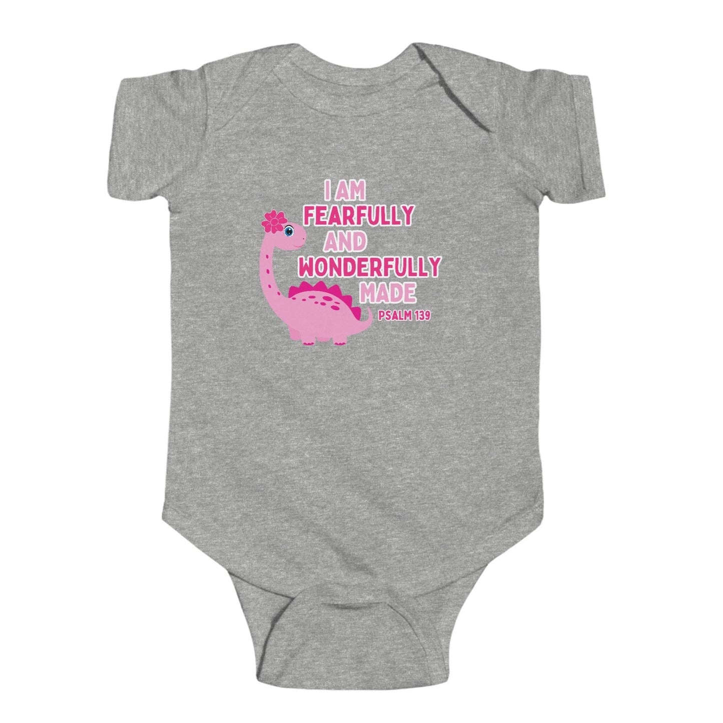 Celebrate the arrival of your newborn girl with our adorable pink dinosaur bodysuit. Made with a soft 100% cotton fabric, this onesie is perfect for your little one's delicate skin. With the bible verse Psalm 139:14, "I am fearfully and wonderfully made," it serves as a reminder of your precious baby's uniqueness. Cataldo Creations