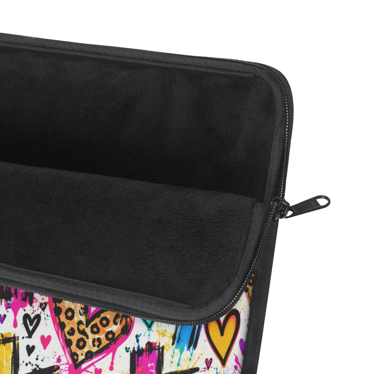 Colorful Christian laptop sleeve featuring bright graffiti-style crosses, pink and turquoise hearts, leopard-print accents, and vibrant paint splatters with black zipper trim.