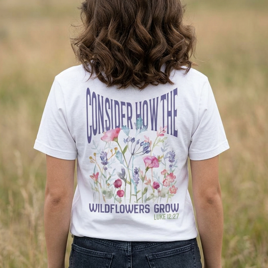 Unisex jersey short sleeve tee featuring floral design with Bible verse Luke 12:27 Christian inspirational shirt
