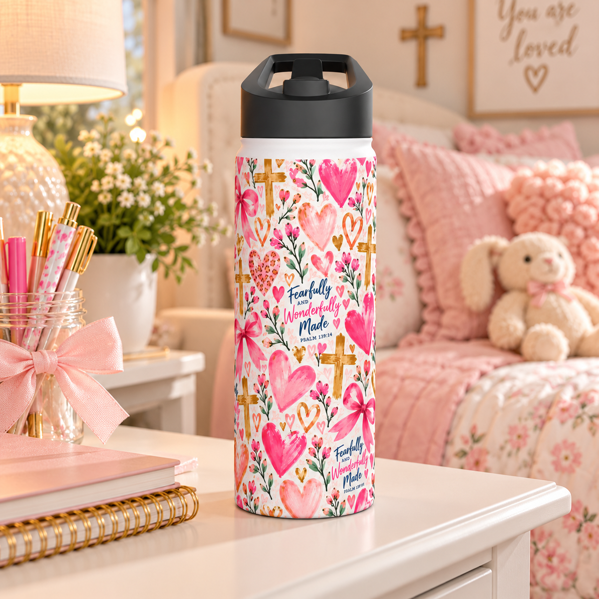 Fearfully and Wonderfully Made Christian insulated water bottle for girls featuring Psalm 139:14, pink hearts, bows, flowers, and gold crosses.