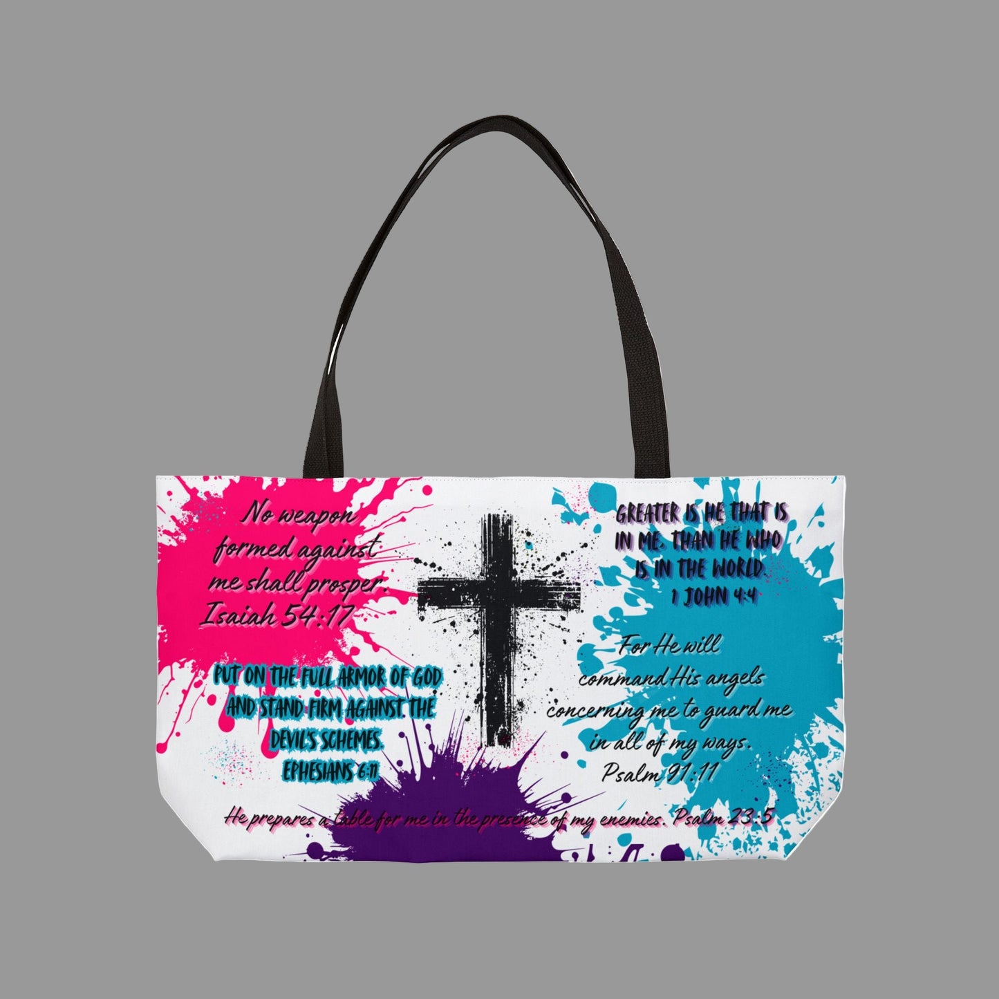 Tote bag with cross design and Bible verse text on a colorful background