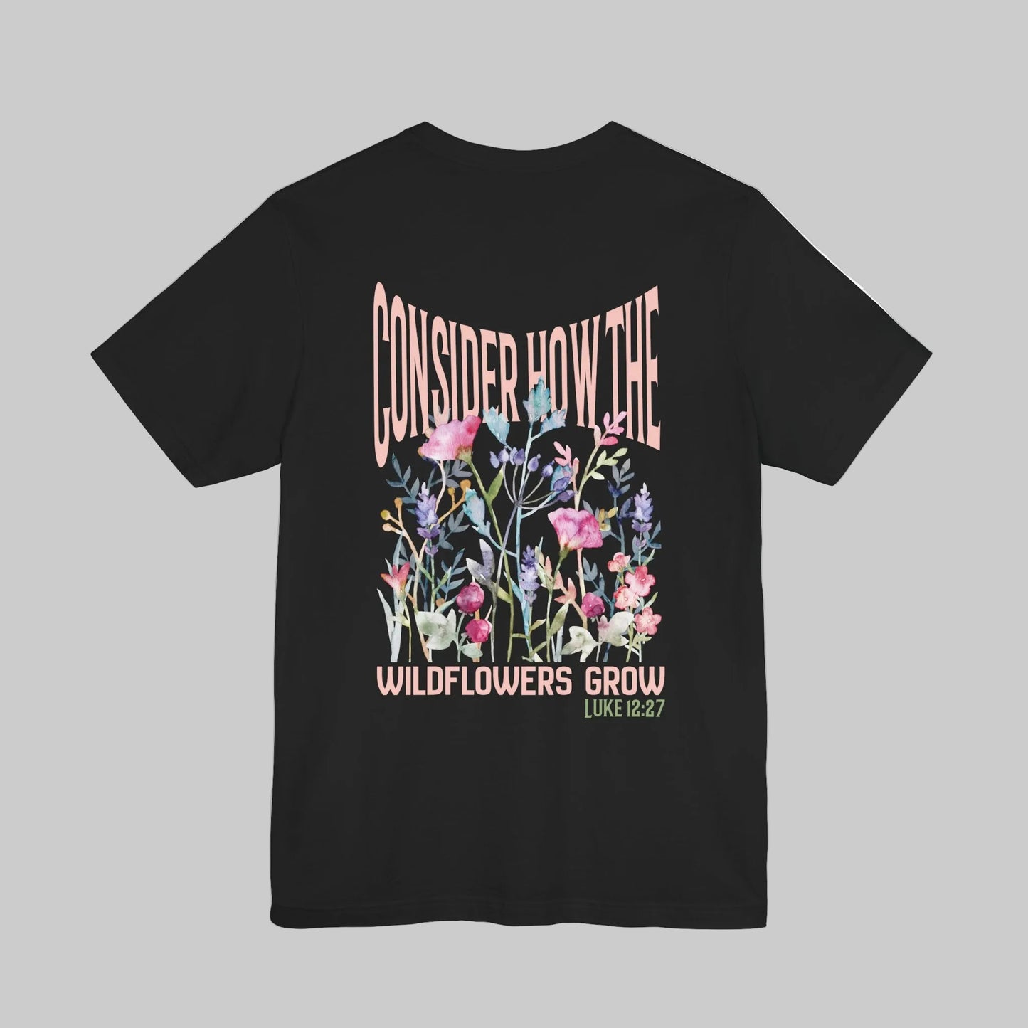 Unisex jersey short sleeve tee featuring floral design with Bible verse Luke 12:27 Christian inspirational shirt