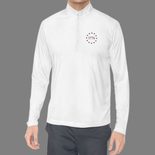 The lightweight patriotic quarter-zip has 1776 on the front chest pocket with One Nation Under God on the back.&nbsp; This stars and stripe, fast drying, long sleeve athletic pullover is a must have for every patriot!&nbsp;