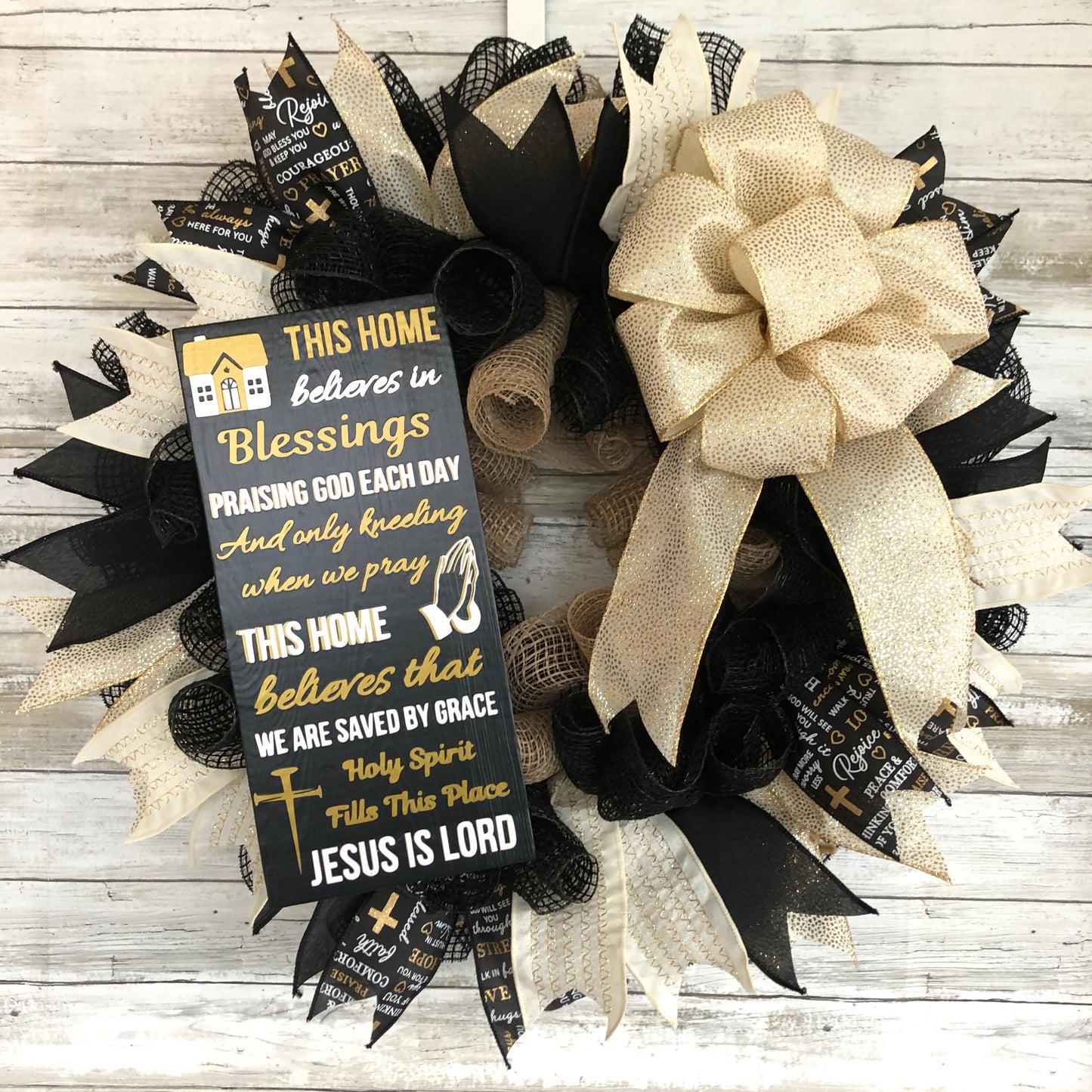 This Home Believes in Sign and wreath.  Black and gold. 