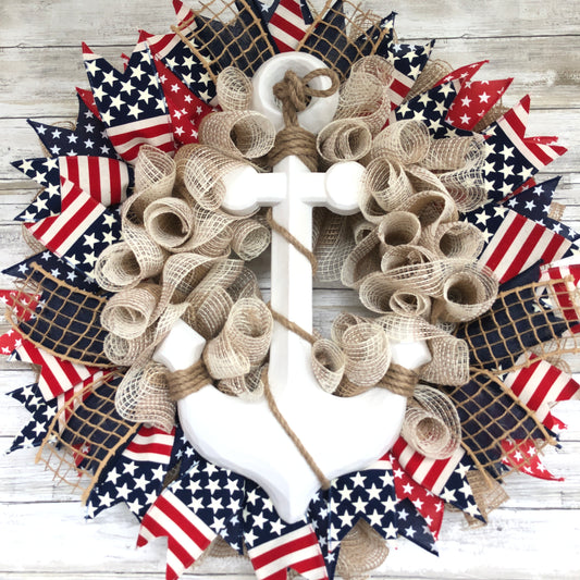 Nautical Anchor Door Wreath. Handmade Door Wreath. Anchors Away! This red, white and blue patriotic door wreath is the perfect wreath for the patriotic boater!  The white wood anchor pops off its stars and stripes backdrop and it is a must have for your home.