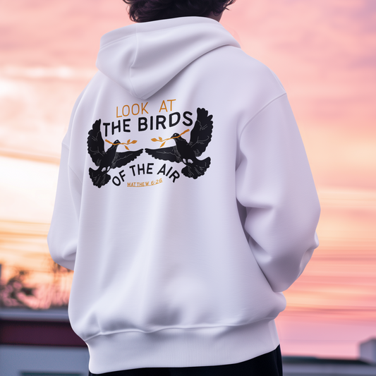 hoodie with a large black bird graphic and the text 'LOOK AT THE BIRDS OF THE AIR' on the back