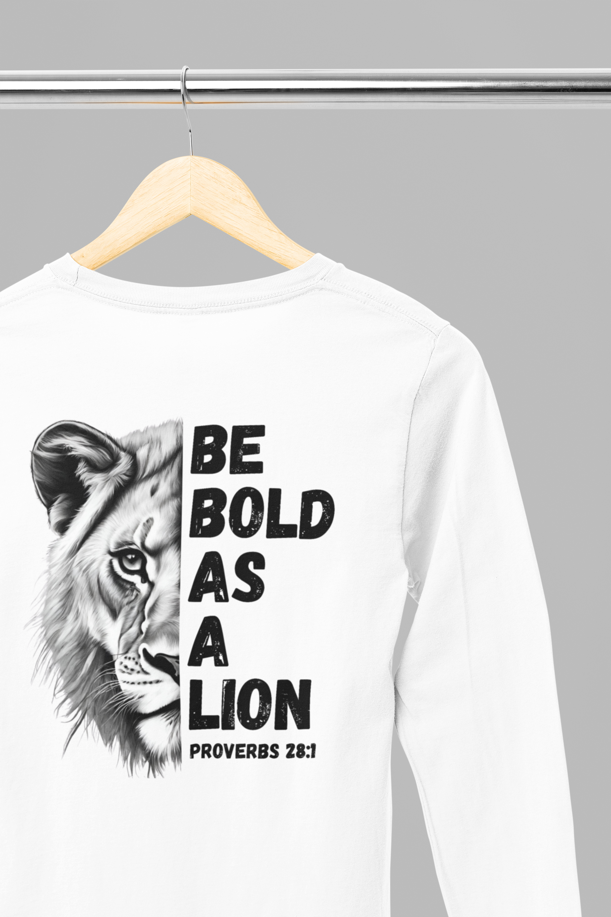 Be Bold As A Lion Christian Proverbs Tee. Bible Verse Lion T-Shirt. Unisex Jersey Long Sleeve Tee. Cross bible verse tee for men and women. 