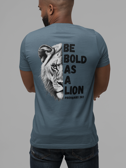 The 'Be Bold As A Lion' black and white graphic tee is a great way to represent your faith in Jesus Christ. The lion face pops with its gorgeous, lifelike markings throughout. In a big bold font, a reminder of God's word in Proverbs 28:1 from the Bible, to "Be Bold As A Lion". With a small cross on the front chest and availability in many colors, this t-shirt is one you will want in every color!