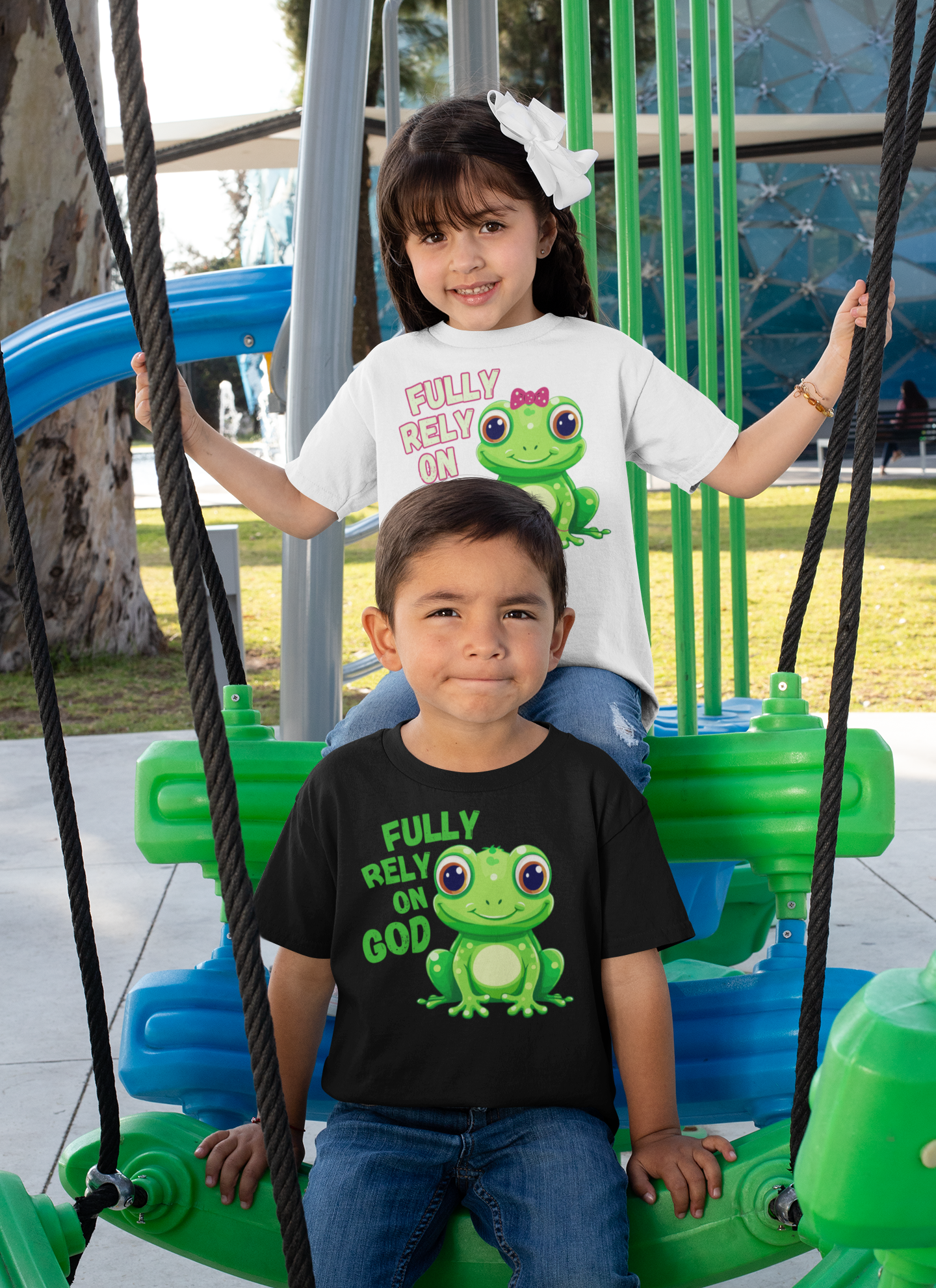 FROG. Fully Rely On God. This cute little girl toddler short sleeve t-shirt has an adorable green frog wearing a pink bow.&nbsp; Alongside are the words Fully Rely On God in light green and pink lettering. Perfect for your toddler girl! Christian toddler tee. Cataldo Creations apparel for toddlers