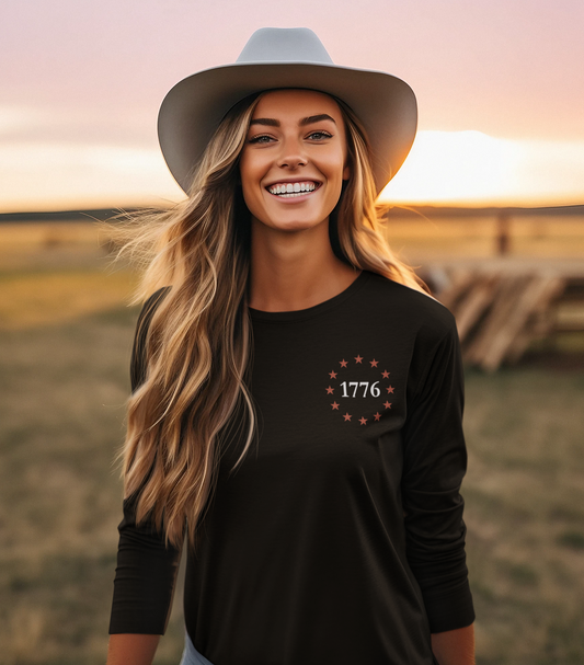 One Nation Under God, 1776 Patriotic long sleeve shirt for men and women. This Cataldo Creations tee has 1776 on the front chest pocket area and One Nation Under God on the back. Show your patriotism with this American Patriot long sleeve tee today!  